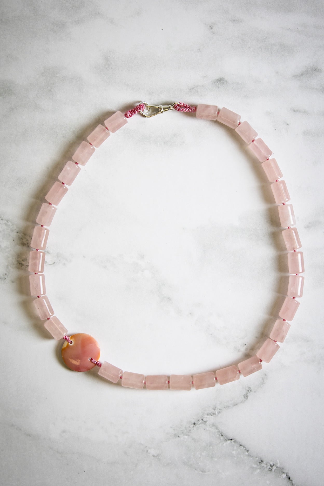 Rose Quartz Cylinder with Hand Carved Conch Shell Coin Necklace