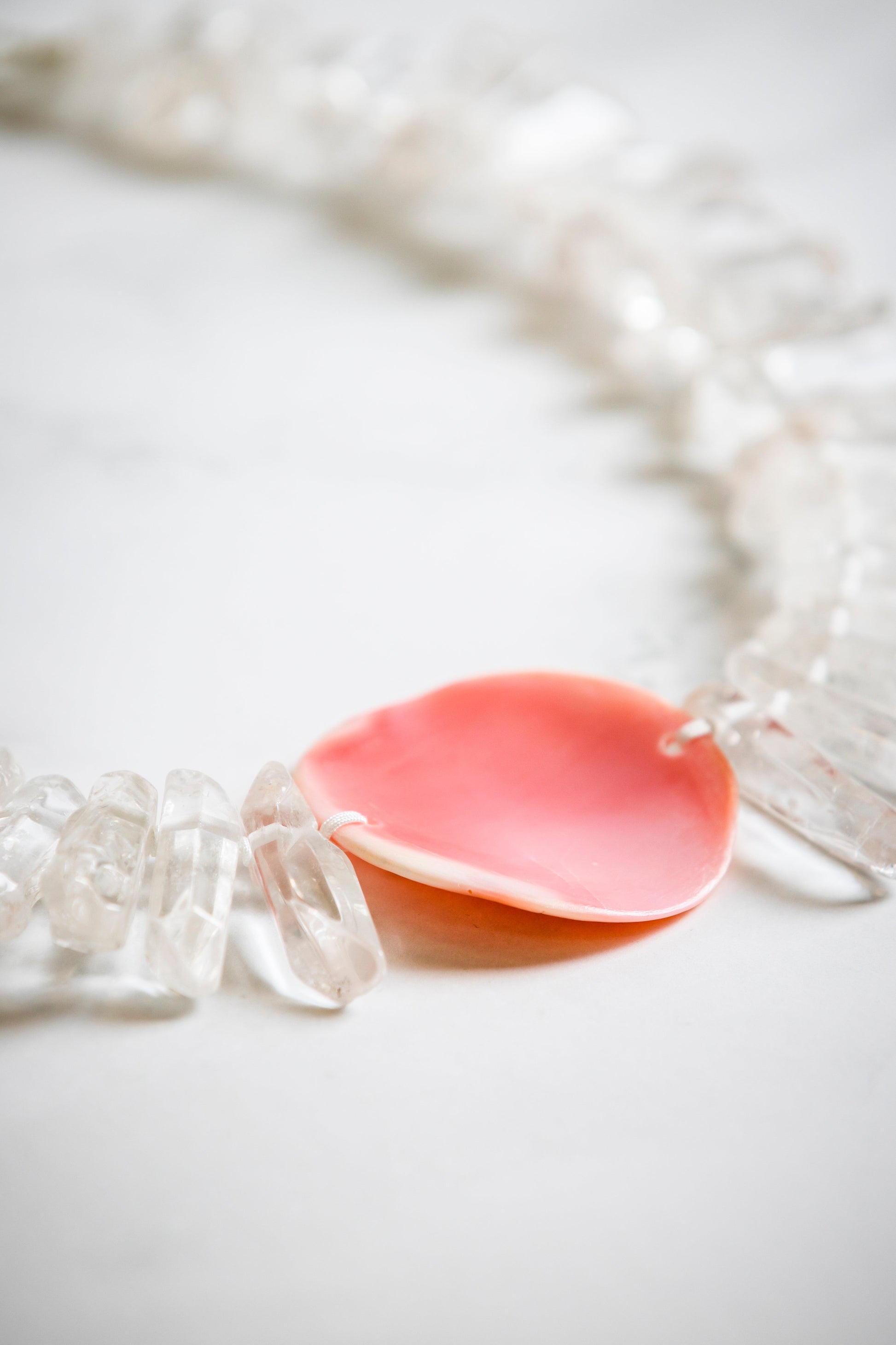 Big Tooth Quartz with Hand Carved Conch Shell Medallion