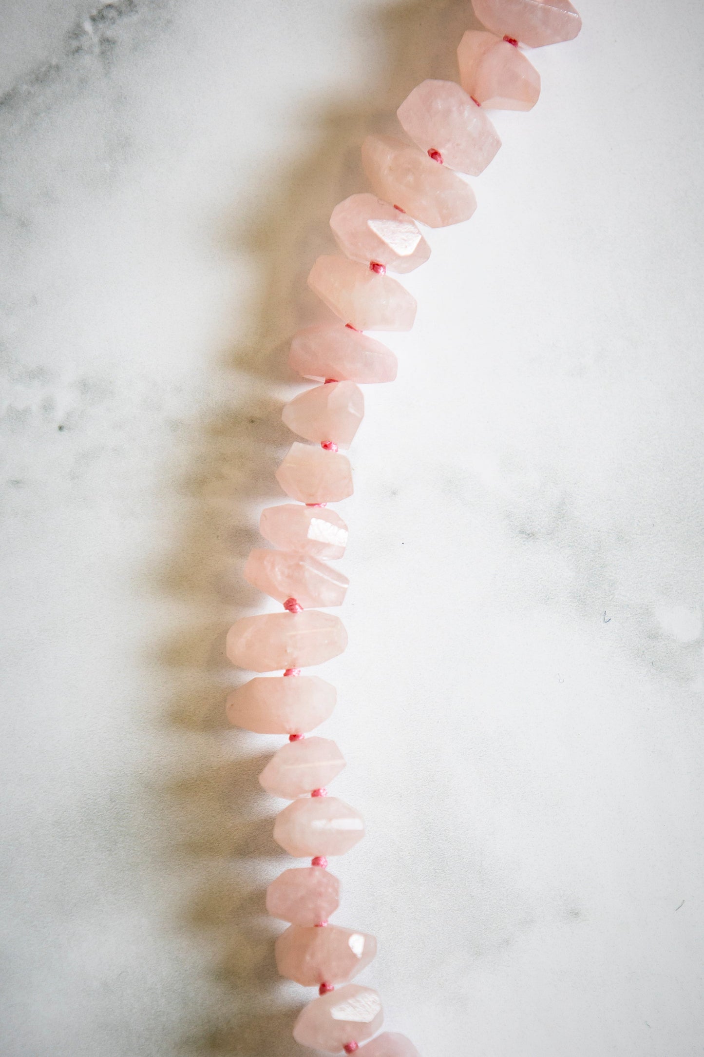 Faceted Pink Morganite with Hand Carved Conch Shell Coin